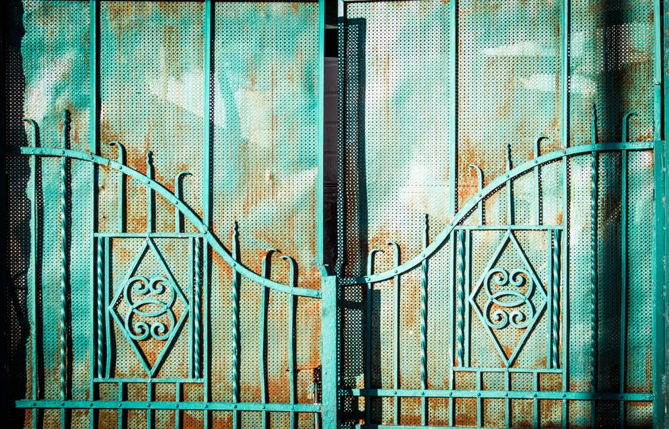 A metal gate with decorative ironwork