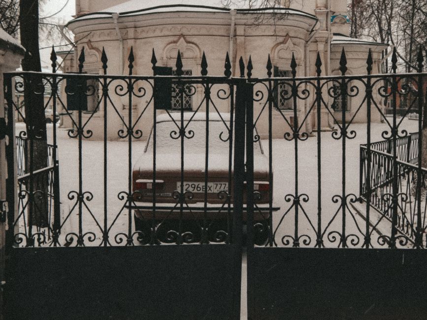A metal gate with decorative ironwork